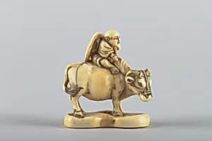 Netsuke of Boy on a Cow by Unknown Artist