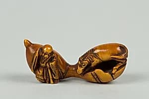 Netsuke of Small Gourd with Horse and Man by Unknown Artist