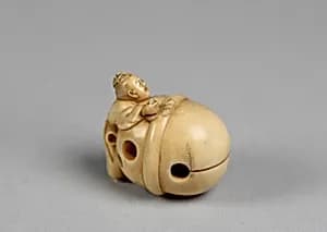 Netsuke in the form of a Bell with a Boy by Unknown Artist