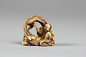 Netsuke of Two Figures and a Dragon by Unknown Artist