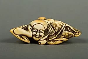 Netsuke of Woman and Monkey by Unknown Artist