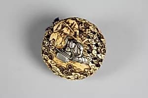 Netsuke of Munechika Forging Blade "Little Fox" by Unknown Artist