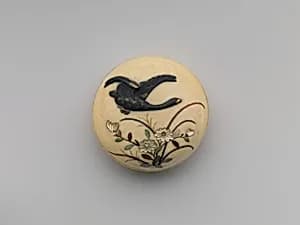 Netsuke of Flying Goose over Flowers by Unknown Artist