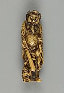 Netsuke of a Man and Two Demons by Unknown Artist