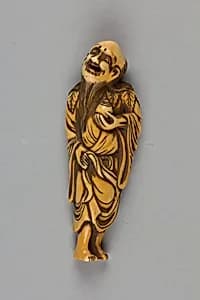Netsuke of Man with Long Beard Carrying a Vase by Unknown Artist