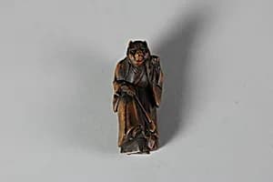 Netsuke of Masked Figure by Unknown Artist