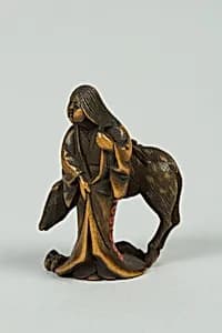 Netsuke of Woman and Deer by Unknown Artist