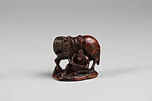 Netsuke of Monkey Holding Horse Rein by Unknown Artist