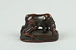 Netsuke of Boy Washing a Horse by Unknown Artist