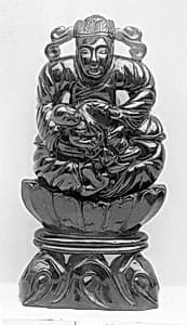 Seated Figure Holding a Child by Unknown Artist