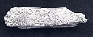 Carved bone fragment by Unknown Artist