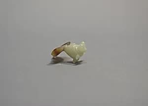 Piece of "False Jade" Carved in Shape of a Flying Fish by Unknown Artist
