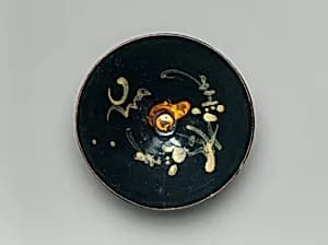 Tea Bowl with Crescent Moon, Clouds, and Blossoming Plums by Unknown Artist