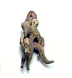 Small Male Figure Supporting Larger Fertility Goddess on His Back by Unknown Artist