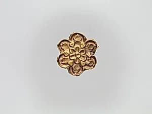 Flower-Shaped Clothing Plaque by Unknown Artist
