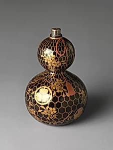 Gourd-shaped Sake Bottle with Cherry Branches, Net, and Tokugawa Family Crests by Unknown Artist