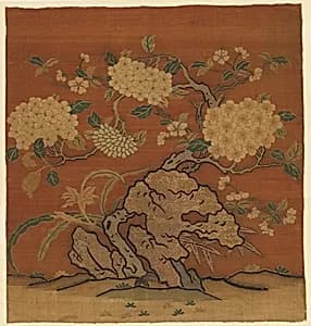 Flowers and Garden Rock by Unknown Artist