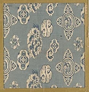 Textile fragment with scattered flowers and elliptical medallions, some with dragons by Unknown Artist