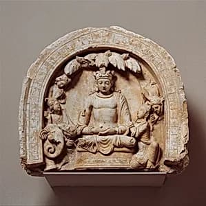 Niche with the Seated Bodhisattva Shakyamuni Flanked by Devotees and an Elephant by Unknown Artist