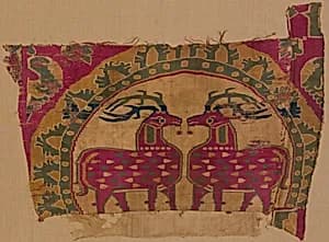 Textile Fragment with Confronted Deer in Partial Pearl Roundel with Serrated Outer Border by Unknown Artist