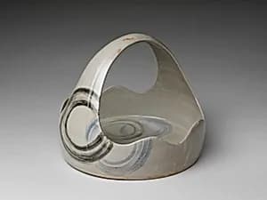 Cake dish with handle and design of whirlpools (Tebachi) by Unknown Artist