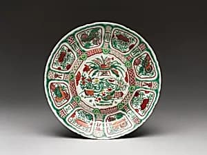 Plate with vase of flowers by Unknown Artist