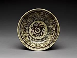 Bowl with flaming solar disk design by Unknown Artist