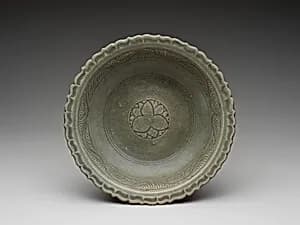 Dish green glazed with floral medallion and foliate rim by Unknown Artist