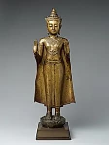Standing Crowned Buddha gesturing protection by Unknown Artist