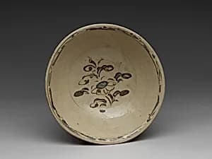 Bowl with iron-brown floral décor by Unknown Artist