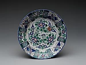 Dish with flowers and auspicious motifs by Unknown Artist