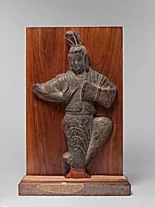 北魏　石雕撃鼓楽伎|Musician playing a drum by Unknown Artist