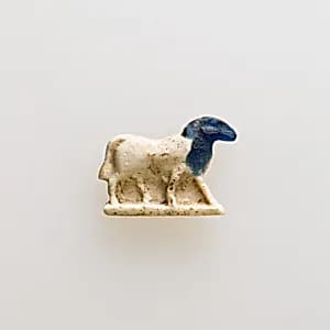 Amulet of a walking ram by Unknown Artist