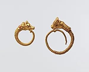Earring with bull head terminal by Unknown Artist