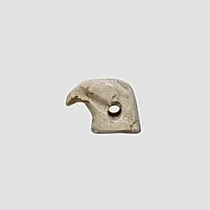 Falcon head amulet by Unknown Artist