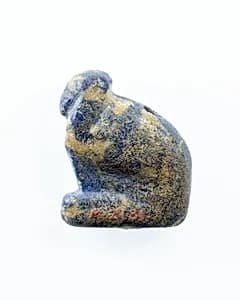 Female sphinx amulet by Unknown Artist