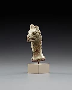 Figurine, griffin head, Nemesis? by Unknown Artist