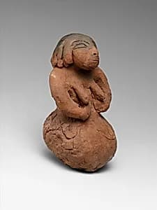 Figurine of a Seated Woman by Unknown Artist
