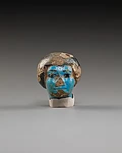 Figurine of head by Unknown Artist