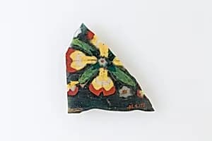 Fragment of floral plaque by Unknown Artist