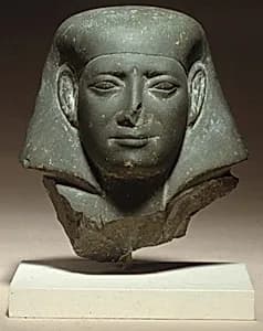 Head of a male statue by Unknown Artist
