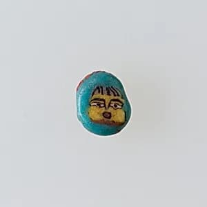 Inlay / bead blank with face by Unknown Artist