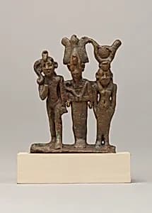 Isis, Osiris and Horus triad by Unknown Artist