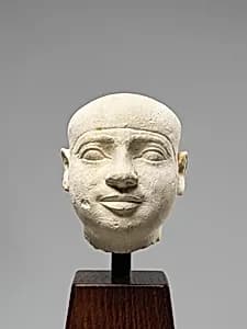 Male Head, Probably from a Serving Statue by Unknown Artist