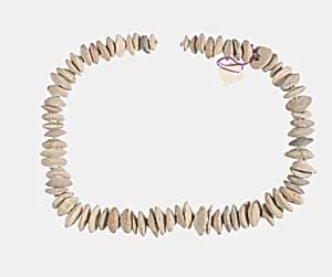 Necklace of white lenticular beads by Unknown Artist