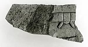 Raised relief fragment by Unknown Artist