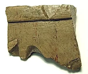 Raised relief fragment by Unknown Artist