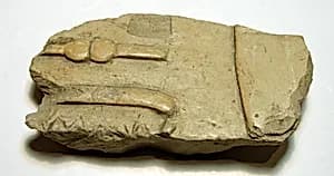 Raised relief fragment by Unknown Artist