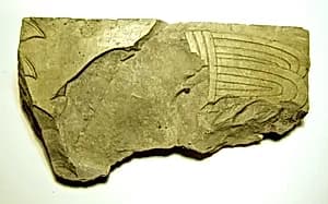 Raised relief fragment by Unknown Artist