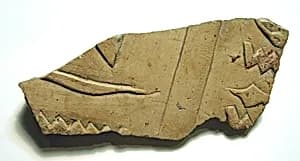 Raised relief fragment by Unknown Artist